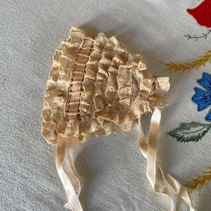 Antique lace baby's christening bonnet, ties under chin and in the back